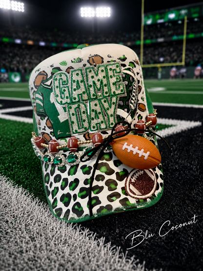 Blu Coconut green game day football Trucker hat