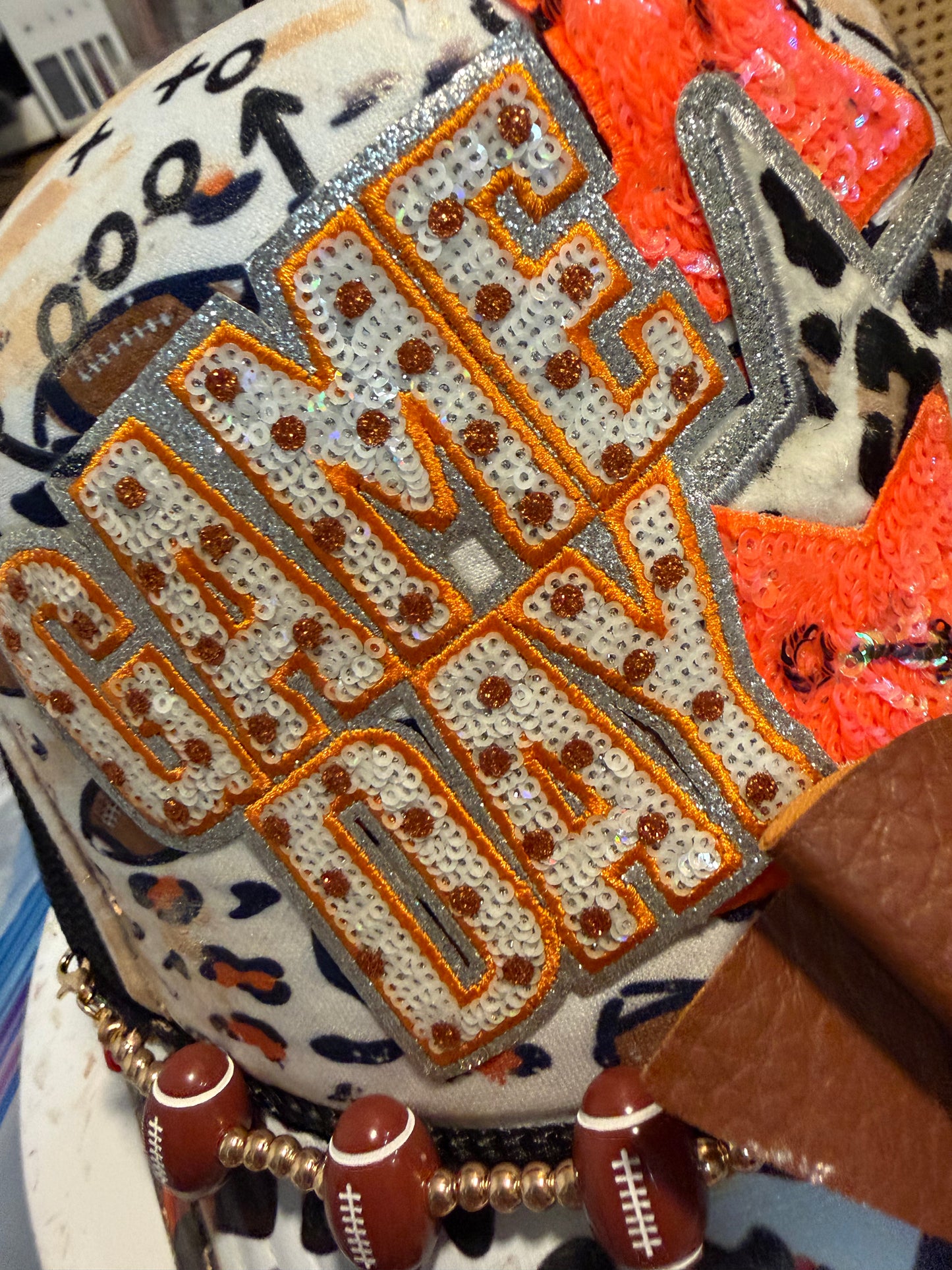 Blu Coconut orange and black leopard print 🏈 Game Day Trucker