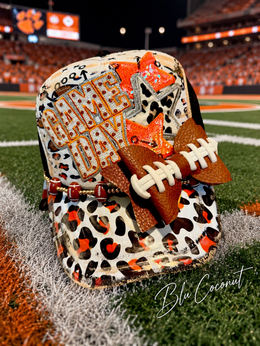 Blu Coconut orange and black leopard print 🏈 Game Day Trucker